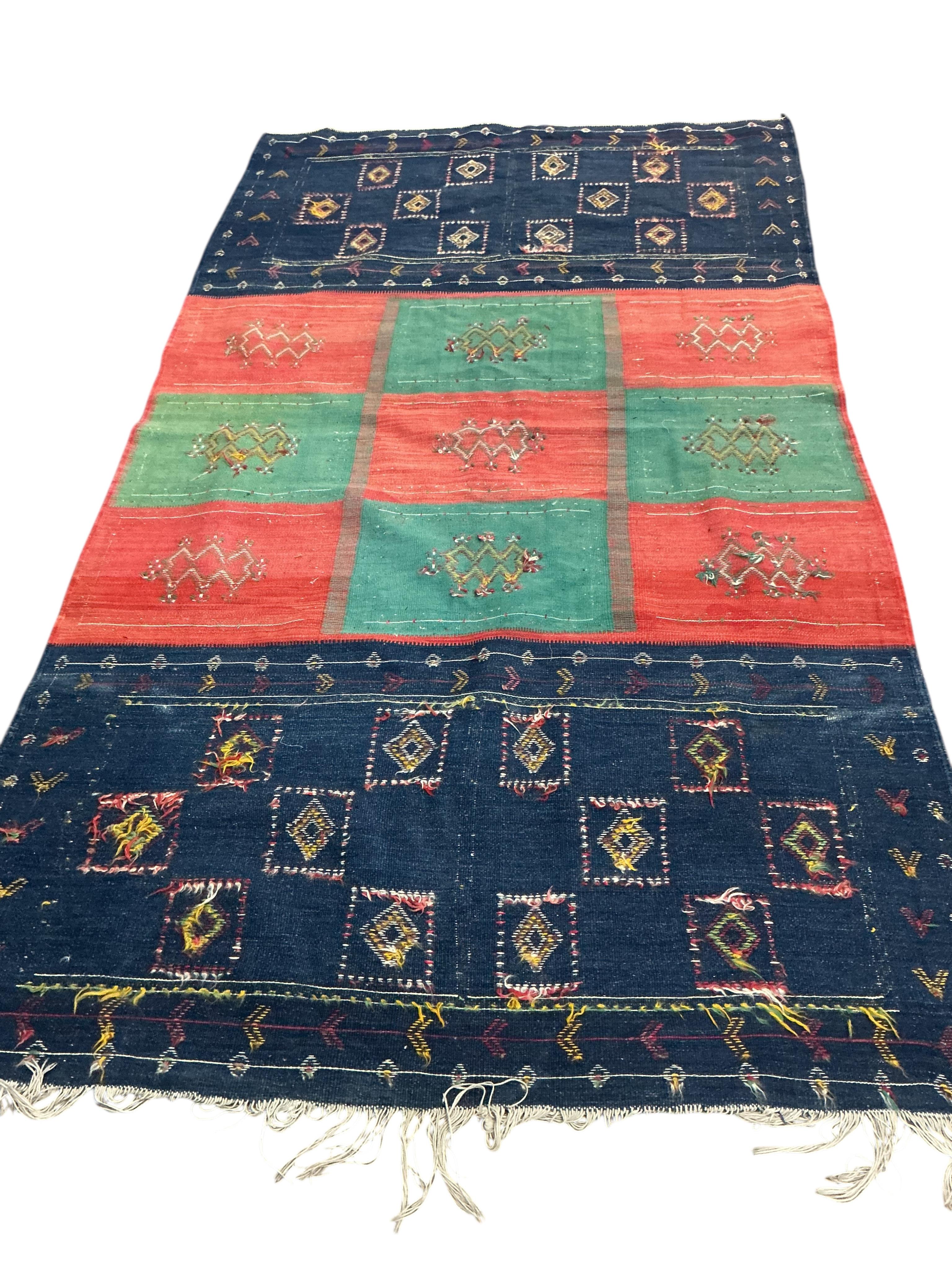 A Kilim polychrome flatweave carpet, 240 x 140cm